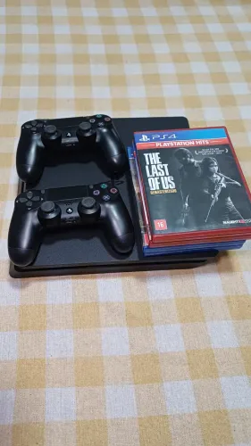 Ps4 com 2 controles e jogos