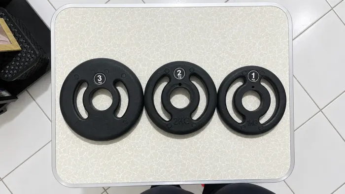Anilha Injetada com furo olímpico 1kg - Semi Novas.