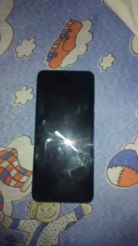 Celular E13
