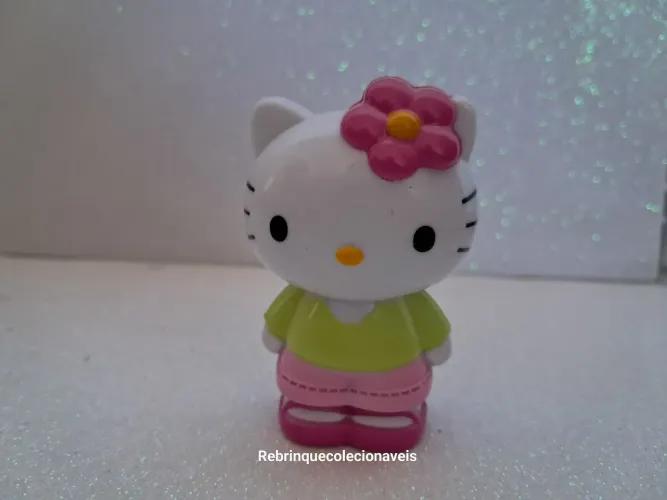Miniatura colecionável Hello Kitty Florzinha no cabelo 6cm