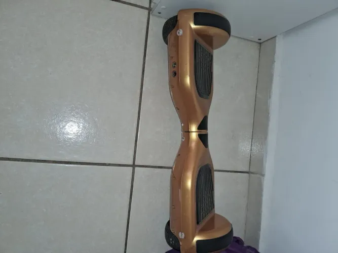 hoverboard (skate elétrico) de 6.5 polegadas na cor dourada/bronze