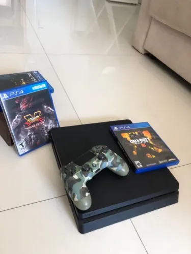 Console ps4 , controle e jogos exclusivos