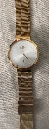 RELOGIO OSLO DOURADO VISOR BRANCO