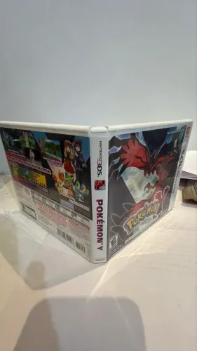 Pokemon Y 3DS na caixa com manuais