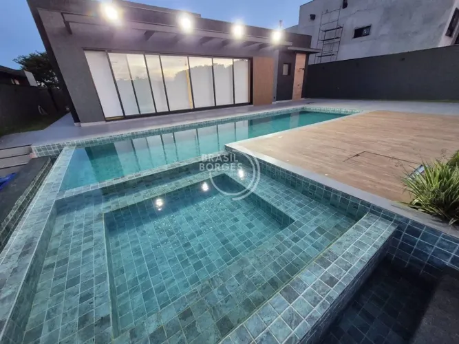Casa Térrea, 4 Suítes, 450 m², Terreno 1.050 m², Piscina Aquecida, Raia e SPA, Energia Fot