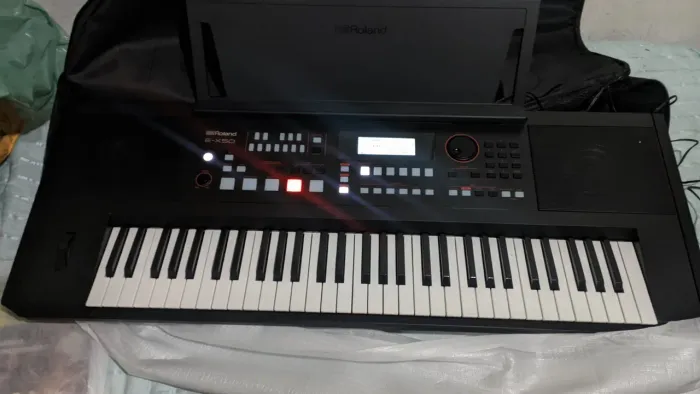 Teclado Roland E-X50 (kit completo)