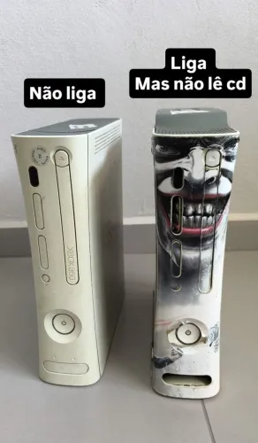 2 Xbox arcade , 1 funciona não pega leitor , outro liga e desliga