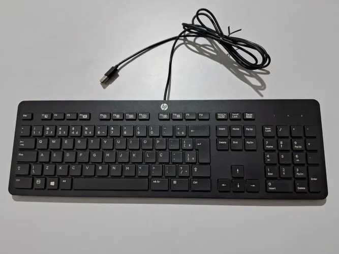 Teclado HP (Tecla "o" acionando sozinha).