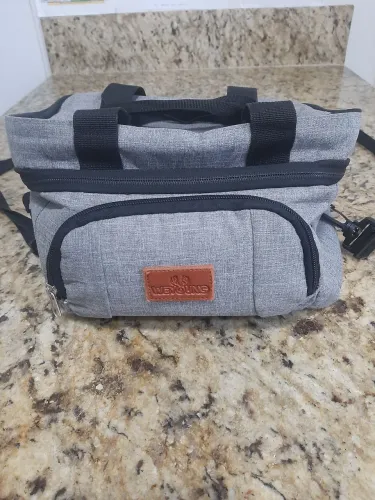 Bolsa de mão para coisas de bebê