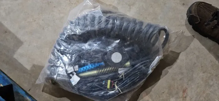 Trava baú e CJ espiral cavalo Autotrac Nova na embalagem