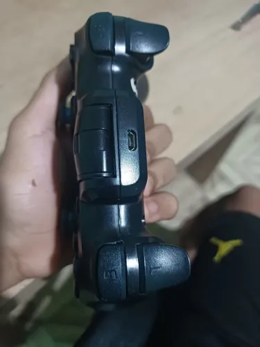 VENDO ESSE CONTROLE PG-9156 COM CARREGADOR