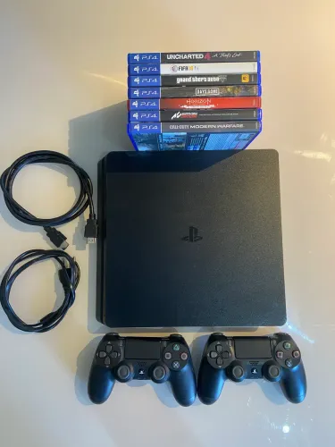 Playstation 4 Slim + 7 jogos + 2 controles