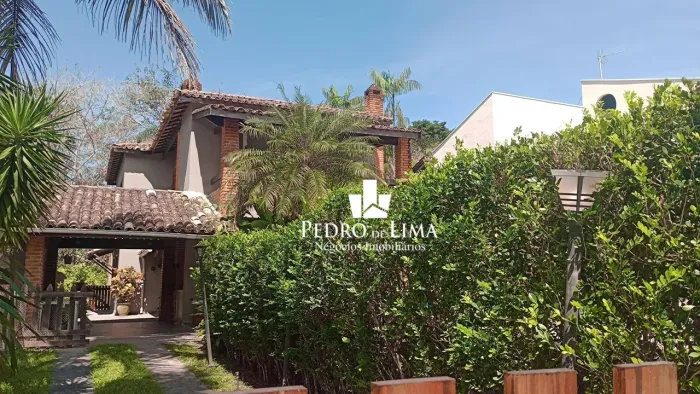 Casa com 3 dormitórios para alugar por R$ 1.300,00/dia - Riviera Módulo 30 - Bertioga/SP