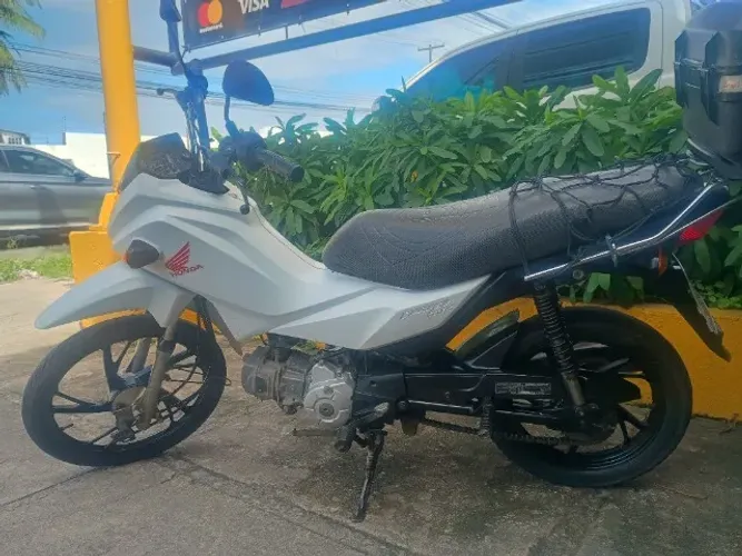 Moto muito boa peneu novo com rodao