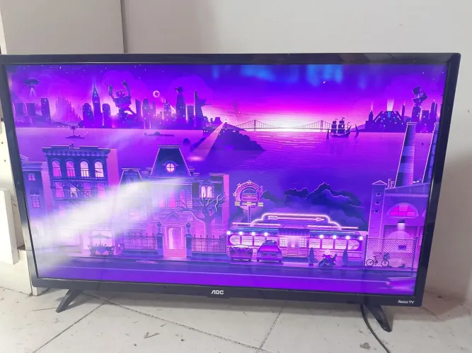 Vendo tv 32 AOC ROKU semi nova.