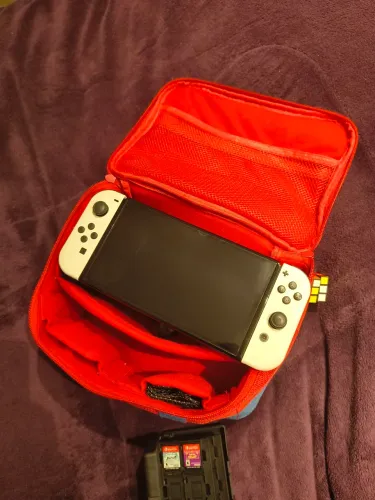 Nintendo switch OLED impecável, desbloqueado, com 2 jogos físicos e vários jogos na memo