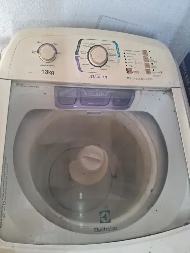 Máquina de lavar com defeito
