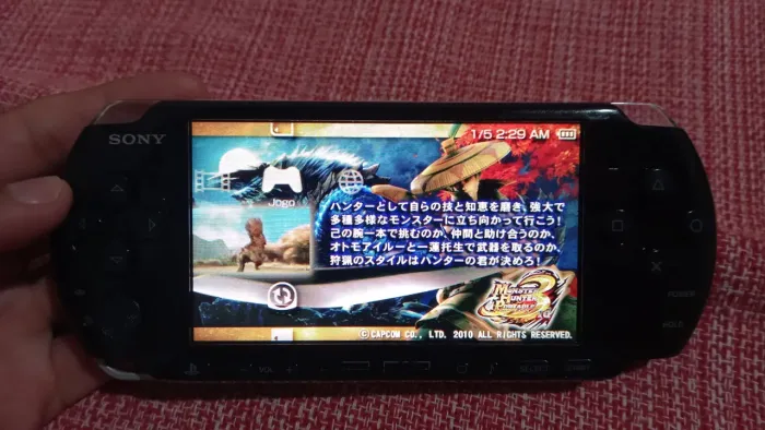 Psp 3001 funcionado perfeitamente com um jogo japonês original Monster Hunter portable 3