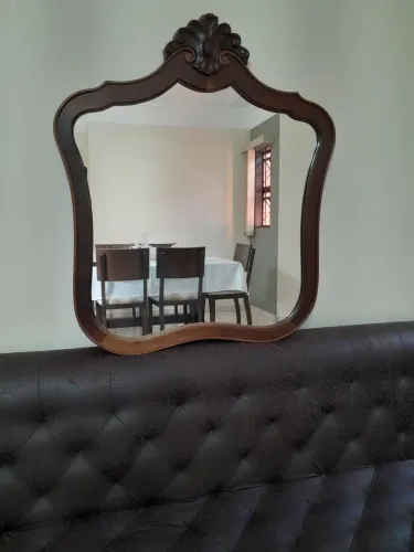 Espelho decorativo com moldura de Imbuia