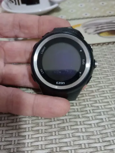 Relógio Ezon T031 GPS peças pra manutenção e carregador