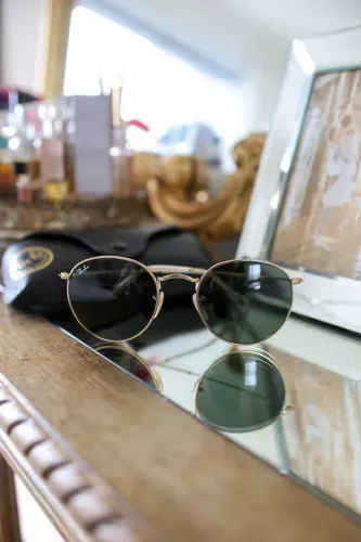 Rayban round clássico dourado safira 2 anos de garantia