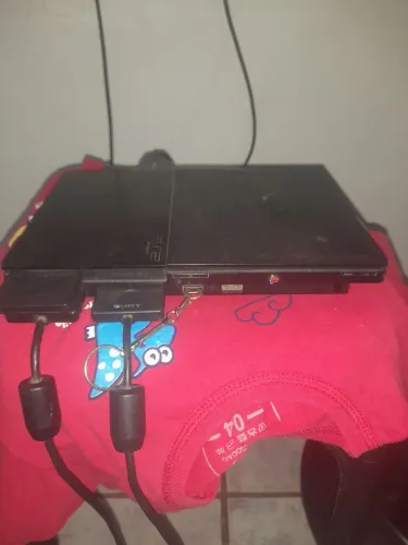 Ps2 com dois controles em otimo estado com jogos no PL 