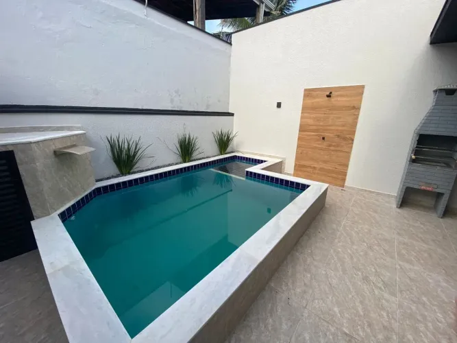 Casa em condomínio frente ao mar com piscina à venda com 2 quartos em Jardim Regina - Itan