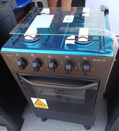 Fogão 4 bocas funcionando normal novo elétrico 