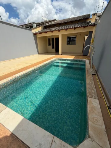 Casa com piscina bairro paraíso