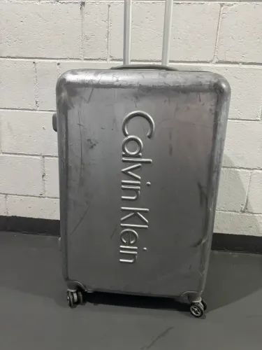 mala de viagem acrílico calvin klein cinza 23kg