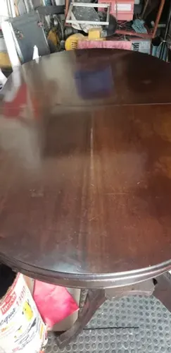 Mesa de madeira oval extensível