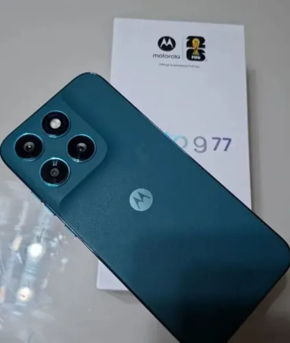 Vendo moto g 77 novo com nota fiscal caixa carregador