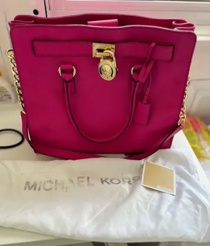Bolsa Pink Michael Kors em couro.