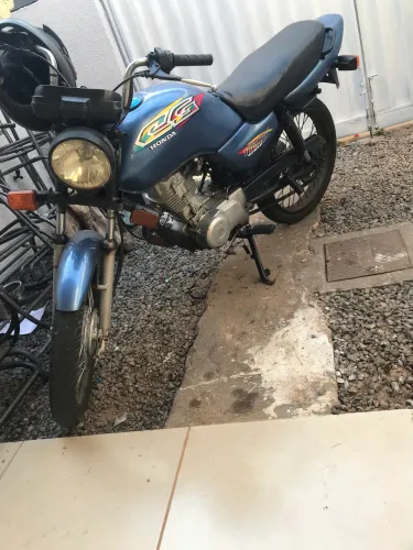 Vendo moto 99 de leilão 