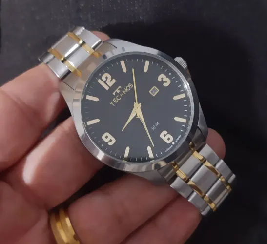 Relógio technos Original RELIQUIA prata com dourado LINDO