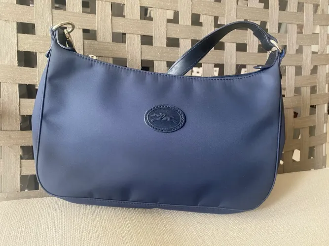 Bolsa longchamp original excelente estado .