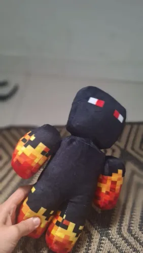 ?Boneco Athos novinho?