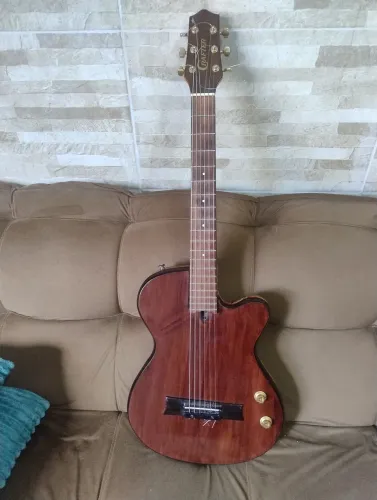 Violão maciço aço ou náilon tá com náilon