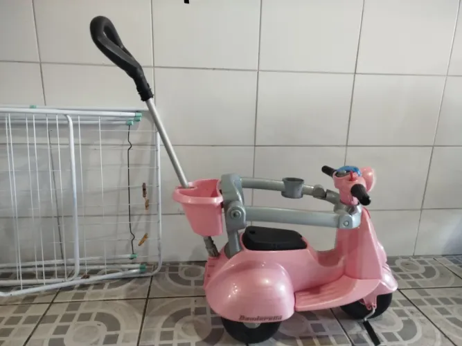 motinha velotrol rosa marca bandeirantes 