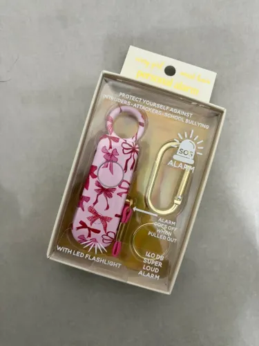 Alarme pessoal SOS 140dB com lanterna LED com estampa laços para mulheres