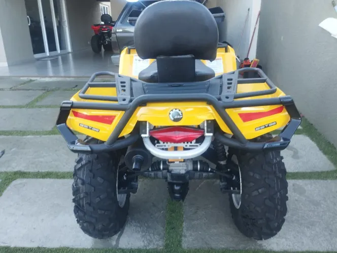 Vendo quadriciclo cam am revisado 4 pneus novos