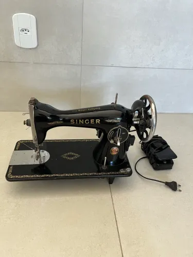 Máquina de costura singer
