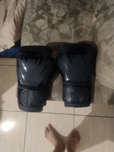 Caneleira e luva de muay Thai