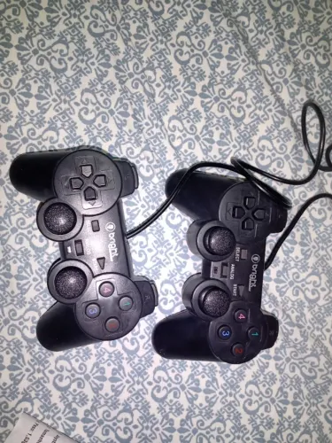Par de Joystick Gamers, novo na caixa, com nota fiscal.