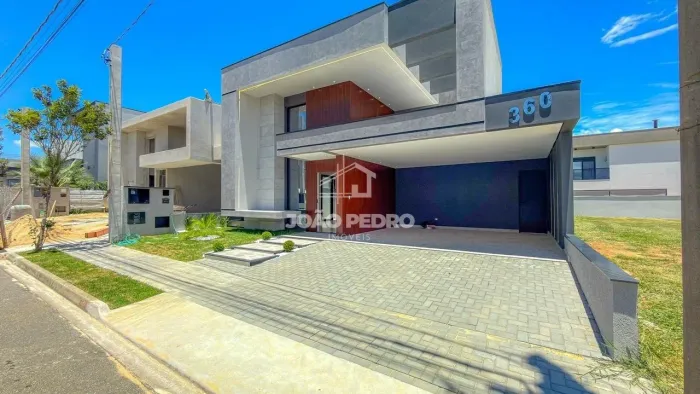 Casa de Alto Padrão com 3 Suítes, Arquitetura Contemporânea e Piscina em Condomínio Exclus