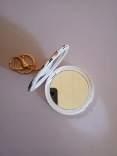 Vendo chaveiro com espelho redondo 