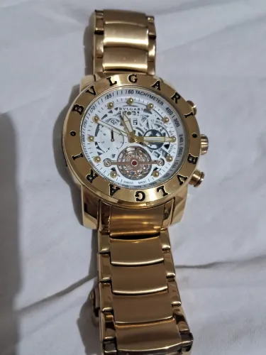 Relógio lindo BVLGaRI dourado único dono