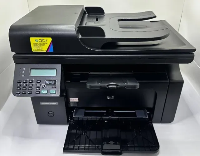 Impressora multifuncional a laser HP M1212nf completa com um toner novo e garantia