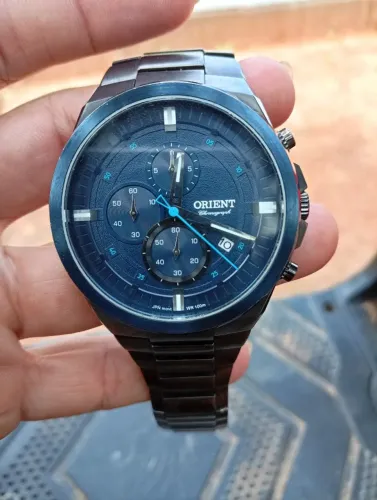 Vende se esse relógio oriente original semi novo 