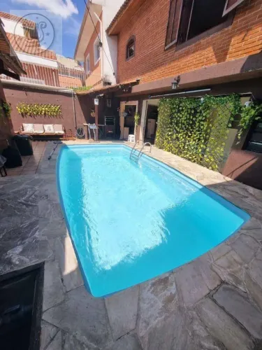 Casa com 3 dormitórios à venda, com piscina tamanho 3 x 5 com prof. de 1,40 na (Zona Norte